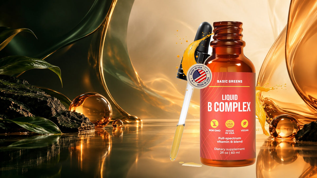 BASIC GREENS Liquid B Complex Drops in a cinematic amber setting